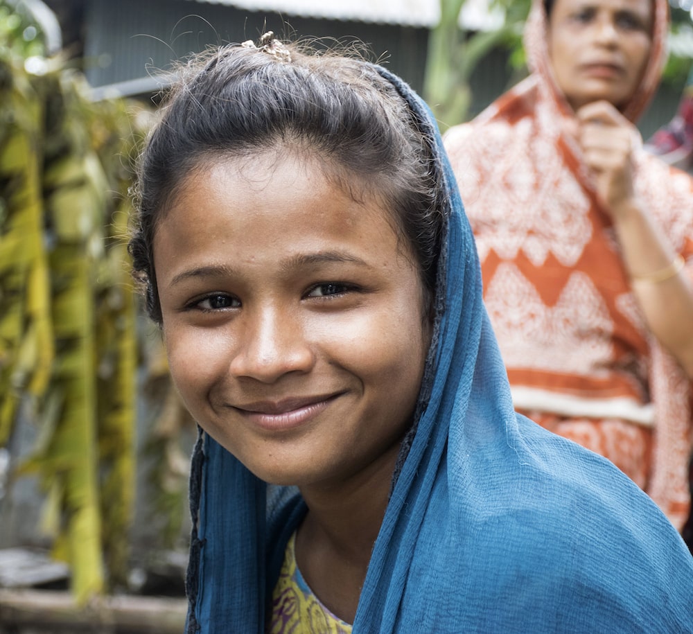 Southeast Asian Girl Smiling At Camera
